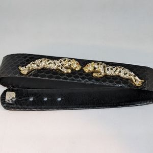 Vintage black and leopard rhinestone belt.